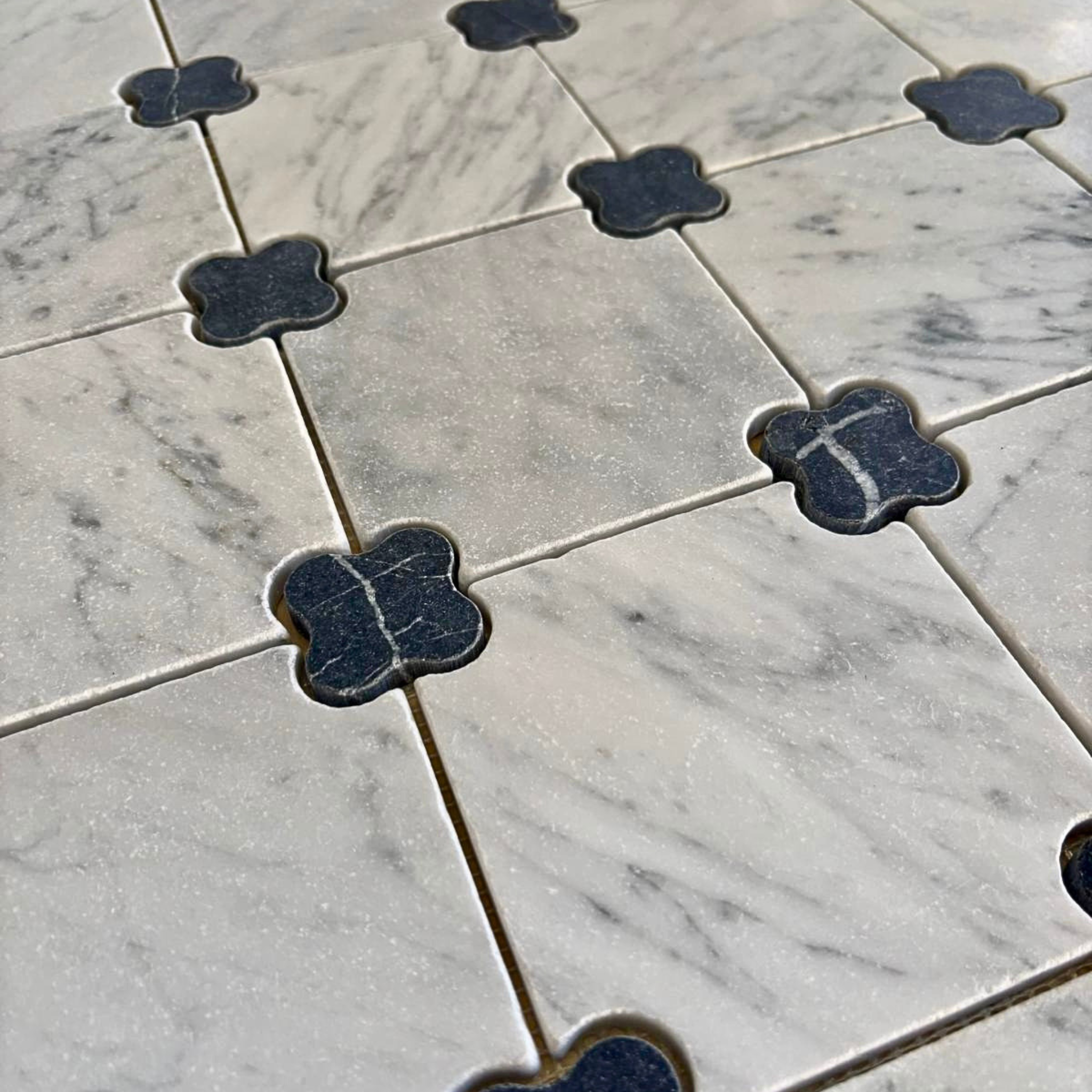 Carrara Nero Marquina with Clover Dot Honed & Tumbled