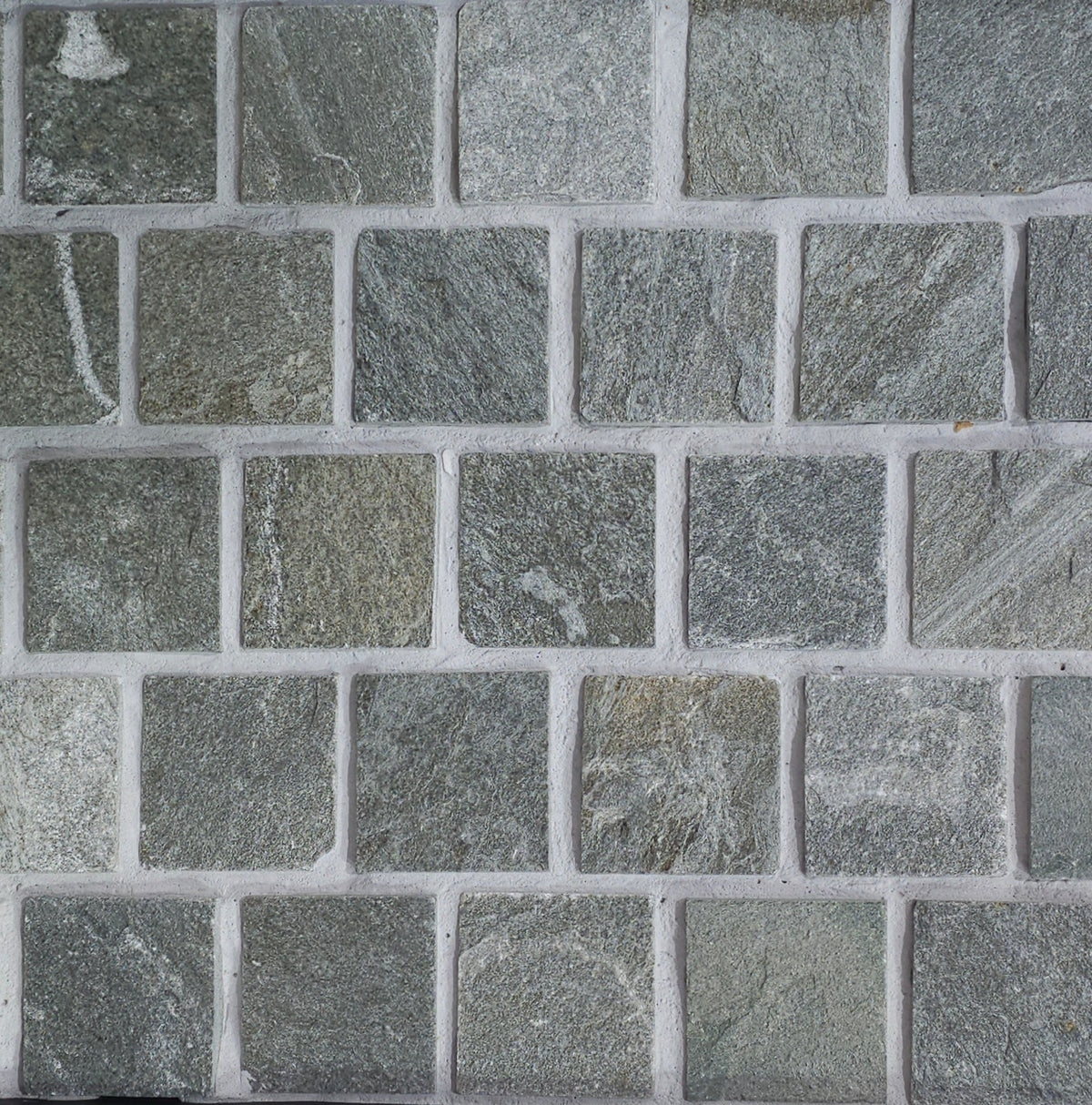 Grecian schist cobbles 100x100x20mm offset sheeted in green and grey | The Stonemen
