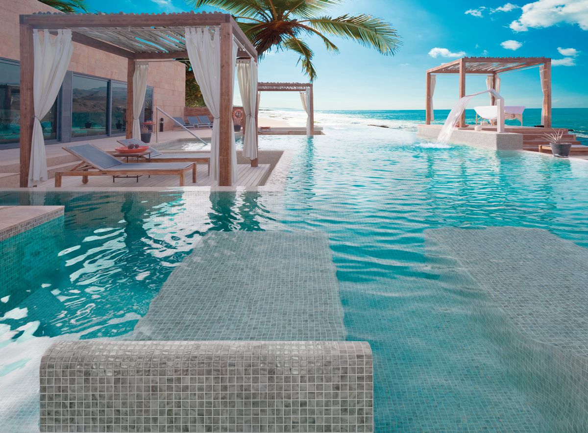 Ash glass mosaic pool installation | The Stonemen