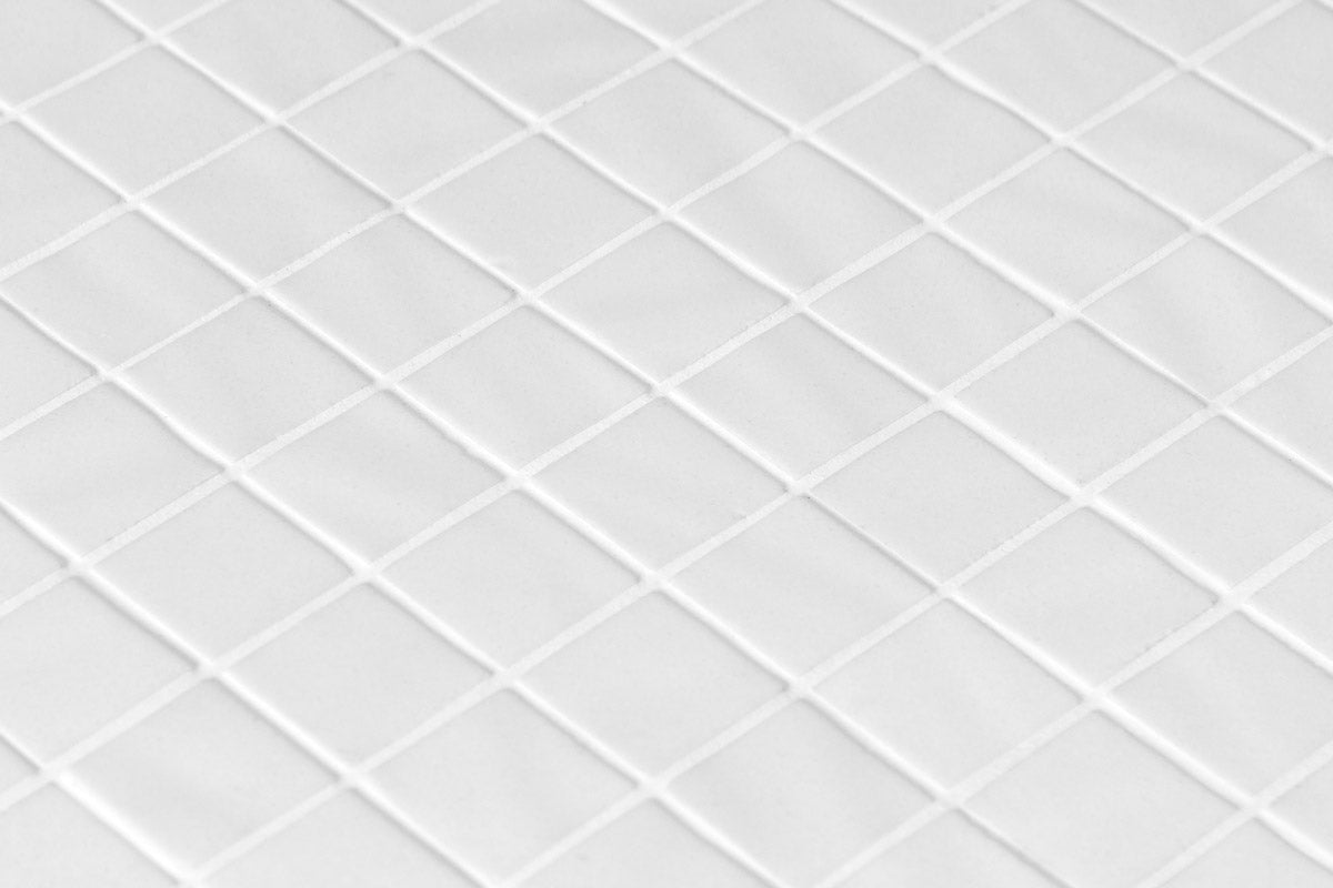 Bone glass mosaic in a wet area | The Stonemen